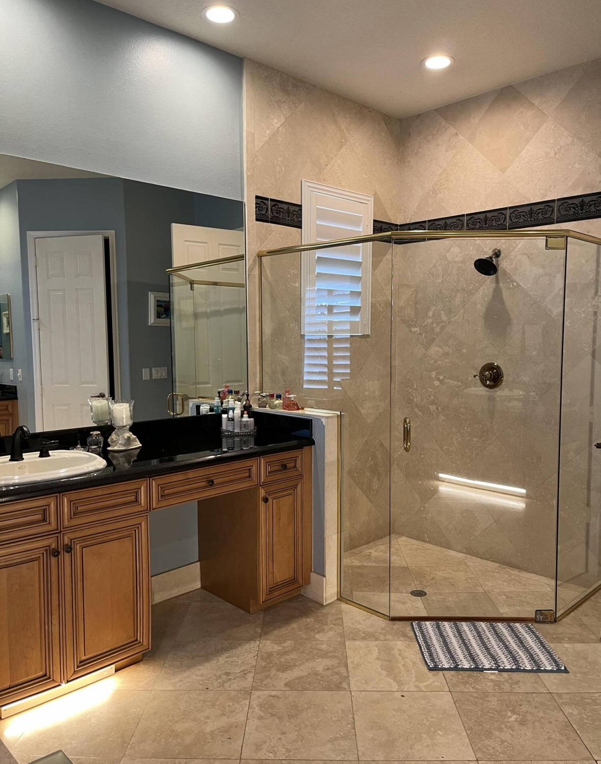 Sunset Shine Home Cleaning team wiping down living room window