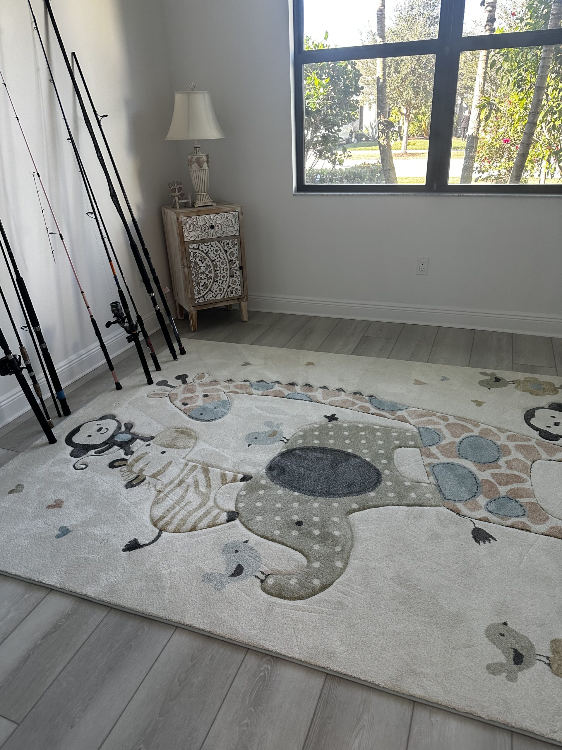 Professional cleaner organizing supplies while performing detailed home upkeep with care
